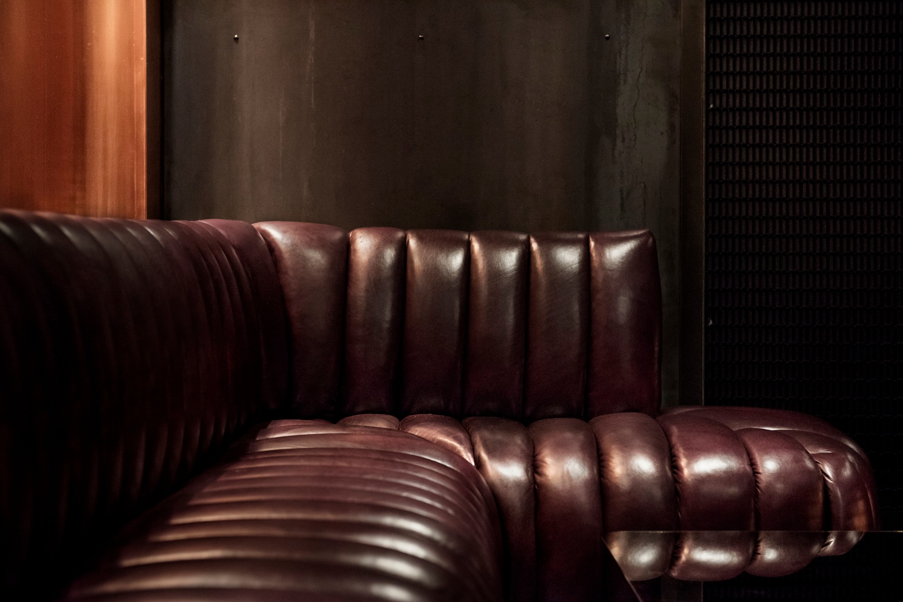 Detail of the custom leather banquette at Himitsu in Atlanta, designed by Tom Dixon Studio.